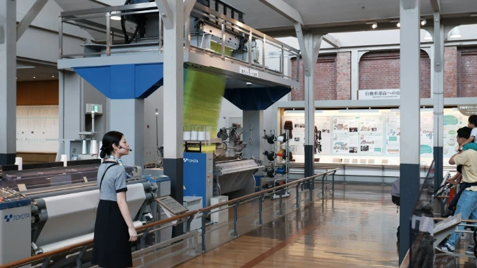 Industrial textile machinery in a museum exhibit